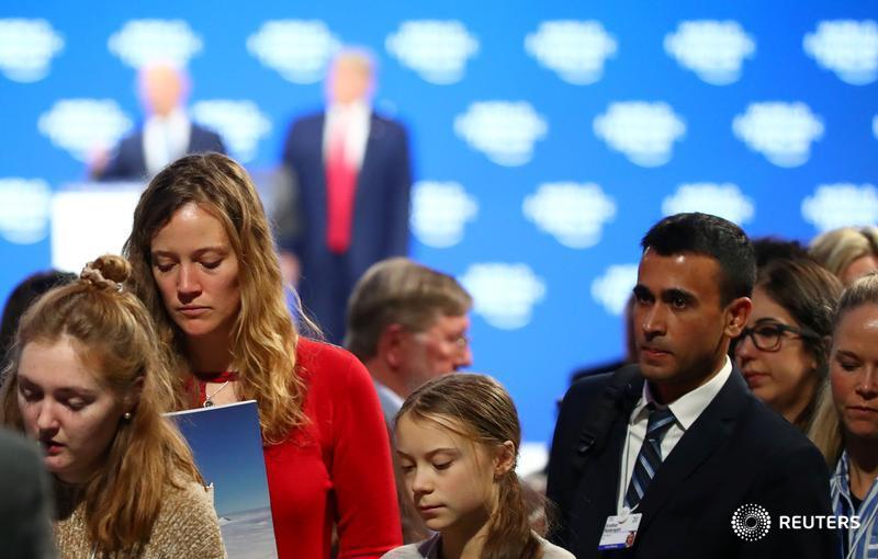 Photo: Denis Balibouse/REUTERS Swedish climate change activist Greta Thunberg leaves after U.S. President Donald Trump's speech at the World Economic Forum in Davos. January 21, 2020