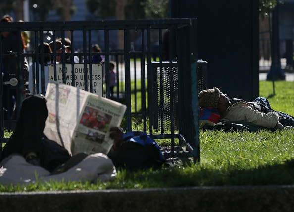Homeless Sullivan reading paper