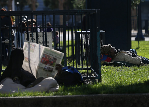 Homeless Sullivan reading paper