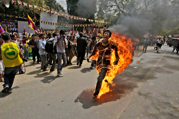 But Why Doesn't the Photographer Try to Help the Man on Fire?