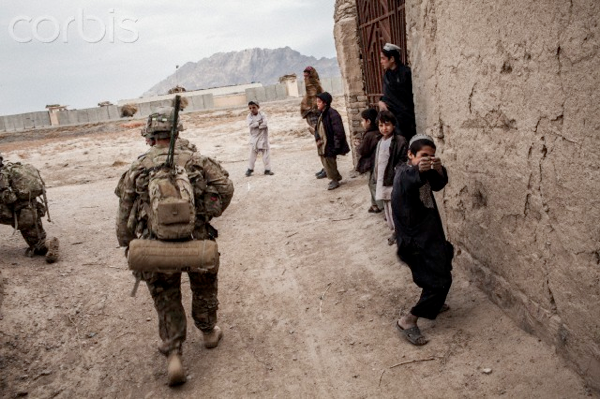 pantomimed shooting US soldiers from Bravo Co. 3rd Battalion, 1st Armored Division as they conducted a combat patrol in his village 2