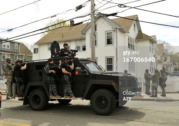 SWAT team vehicle through Watertown