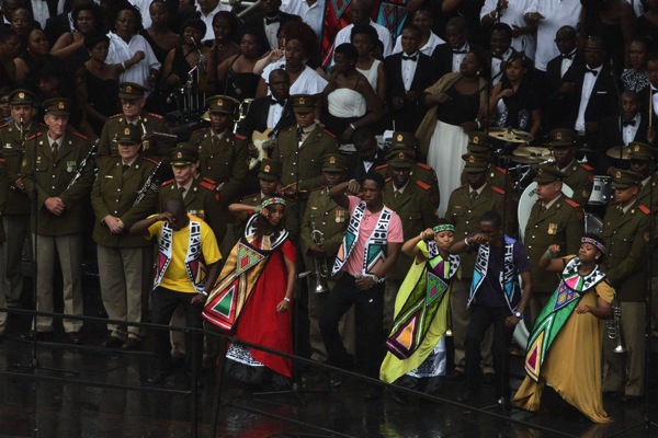 Dancing in front of soldiers Mandela Tribute