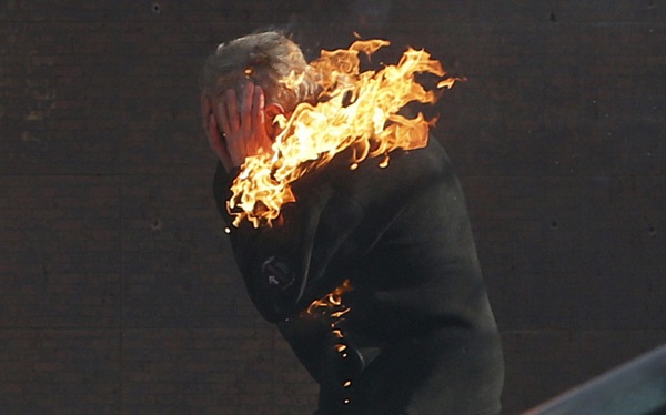 Kiev protester on fire AP