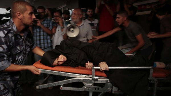 On Carolyn Cole’s Striking Photo of an Injured Muslim Woman in Gaza