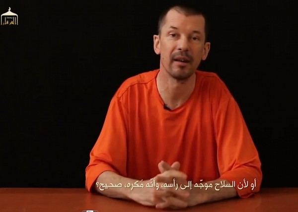 From the Islamic State News Desk, Hostage-Anchor John Cantlie Reporting