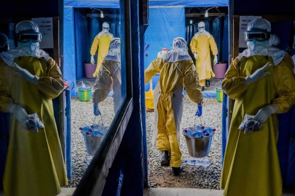 Why that NYT Liberia Photo, Reflecting an Ebola Treatment Unit in the Mirror, Was so Contagious