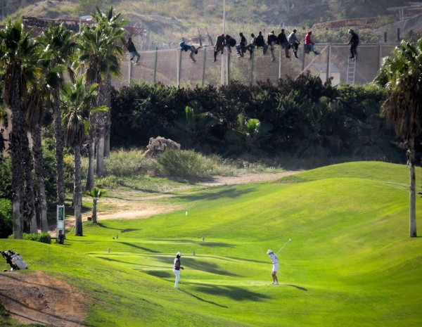 On those Viral Photos of African Migrants atop the Melilla Golf Course Fence