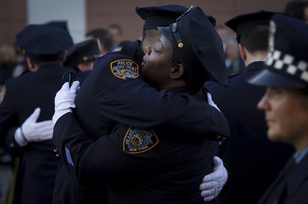 NYPD police Ramos funeral hug