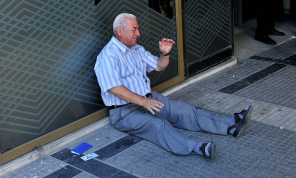 Myth Of The Self-Inflicted Wound: A Deeper Look At That Photo Of The Crying Greek Pensioner