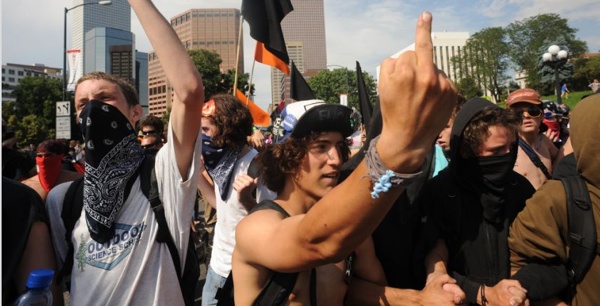 Protester Flips The Bird