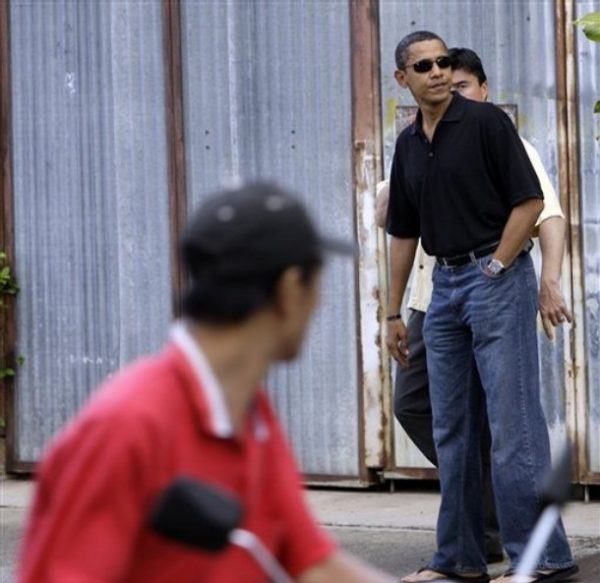 Democratic presidential candidate Sen. Barack Obama, D-Ill., takes a brief walk through his old neighborhood while visiting his ailing grandmother in Honolulu, Friday, Oct. 24, 2008. (AP Photo/Alex Brandon)