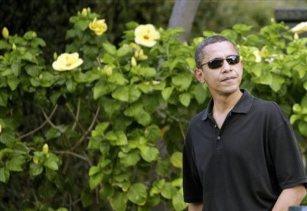 Democratic presidential candidate Sen. Barack Obama, D-Ill., takes a brief walk through his old neighborhood while visiting his ailing grandmother in Honolulu, Friday, Oct. 24, 2008.(AP Photo/Alex Brandon)
