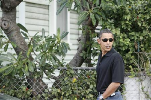 Obama walks around his old neighborhood after visiting his ailing grandmother in Honolulu, Hawaii October 24, 2008. Hugh Gentry/Reuters