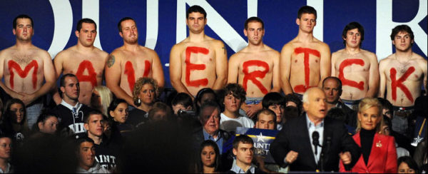image: Ricky Carioti-The Washington Post. caption: Oct. 22: Students at St. Anselm College display "MAVERICK" on their chests as republican presidential candidate John McCain speaks during a rally at the New Hampshire college