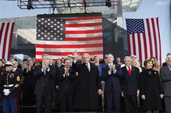 President Bush, and first lady Laura Bush, arrive to participate in the rededication ceremony of the Intrepid Sea, Air and Space Museum in New York, Tuesday, Nov. 11, 2008. (AP Photo/Gerald Herbert)