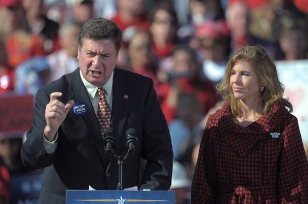 Former US Republican senator from Virginia George Allen speaks ahead of Republican presidential candidate John McCain during a rally on November 1, 2008 in Springfield, Virginia. Mc Cain and Democrat rival Barack Obama enter the final weekend of their epic race for the White House, scrambling across several states in a last dash for votes. On right is Allen's wife Susan. AFP PHOTO/Mandel NGAN (Photo credit should read MANDEL NGAN/AFP/Getty Images)