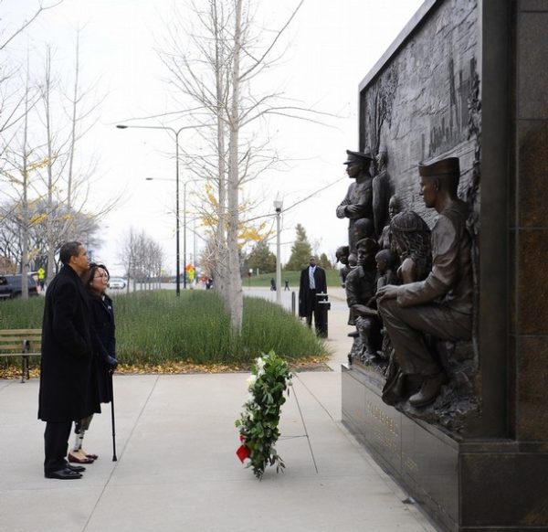 CHICAGO - NOVEMBER 11: (AFP OUT) U.S. President-elect Barack Obama (L) and Gulf War veteran Tammy Duckworth honor America's veterans on Veterans Day at the Bronze Soldiers Memorial November 11, 2008 in Chicago, Illinois, The national holiday, held on the anniversary of the end of World War I, honors all those who have served their country in the military. (Photo by Tannen Maury-Pool/Getty Images)