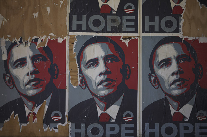 Christopher Morris / VII for TIME. caption: Obama posters remain on a a wall in Washington, D.C.