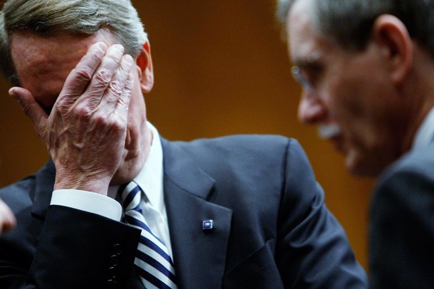 WASHINGTON - DECEMBER 04: Richard Wagoner Jr., chairman and CEO of General Motors (L) wipes his eyes as he awaits the start of a Senate hearing on the auto industry December 4, 2008 in Washington, DC. Leaders from the three major U.S. automakers are scheduled to appear before members of the Senate today to discuss proposed bailout legislationm for their industry. Also pictured at right is Ron Gettelfinger, president of the International Union, United Automobile (Photo by Chip Somodevilla/Getty Images)