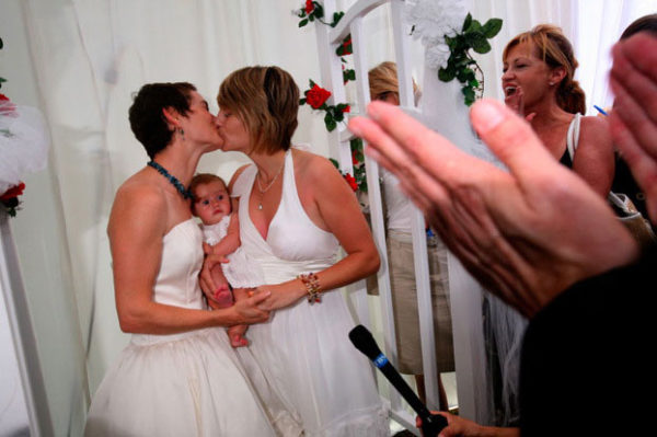 Monica Almeida/The New York Times. caption: A wedding in West Hollywood CA in June after the state’s highest court legalized same-sex marriage. Five months later, voters approved an amendment to the State Constitution that bans the marriage.