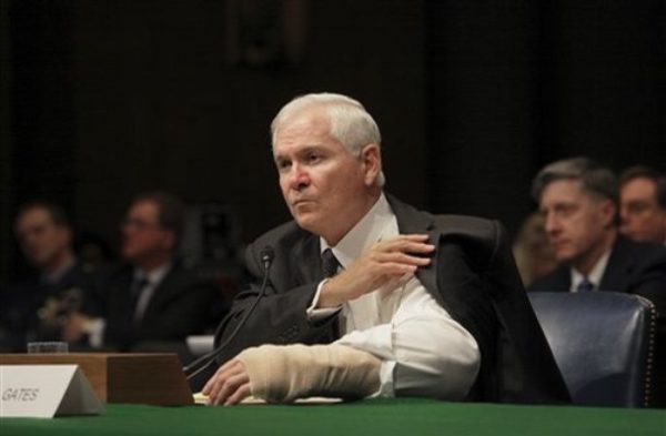 Defense Secretary Robert Gates testifies about strains on the Pentagon's budget as President Barack Obama plans to shift military resources away from Iraq and toward Afghanistan, during an a appearance before the Senate Armed Services Committee on Capitol Hill in Washington, Tuesday, Jan. 27, 2009. Gates, the only Cabinet holdover from the Bush Administration, is recuperating from surgery to his left arm which he injured during Christmas handling snow equipment. (AP Photo/J. Scott Applewhite)