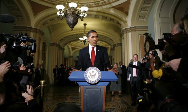 U.S. President Barack Obama speaks to reporters during his visit to the Capitol in Washington January 27, 2009. Obama will try to try to persuade reluctant Republicans to support a $825 billion package he says is essential to resuscitate a plunging economy. REUTERS/Kevin Lamarque   (UNITED STATES)