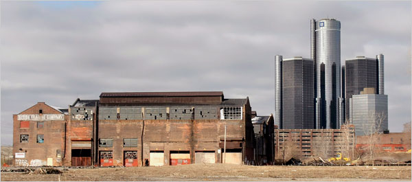 An abandoned building in Detroit General Motors world headquarters building serving as a backdrop. On Sunday, the Obama administration demanded the resignation of GM chairman and chief executive, Rick Wagoner, as a condition of the administration's ongoing bailout plan for GM and Chrysler. Photo: Bill Pugliano/Getty Images