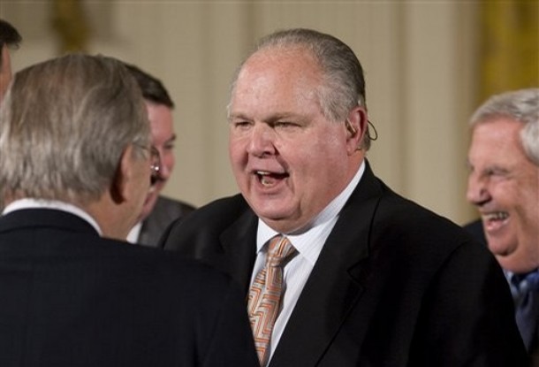 ** FILE ** In this Tuesday, Jan. 13, 2009 file photo, conservative talk radio host Rush Limbaugh talks with former Defense Secretary Donald H. Rumsfeld, left, in the East Room of the White House in Washington. Out of power and out of favor, the Republicans must choose: work with a popular new president who is seeking their input or set themselves apart by opposing his economic rescue plan and pray that it fails. So far, it's been a touch of both.  (AP Photo/J. Scott Applewhite)