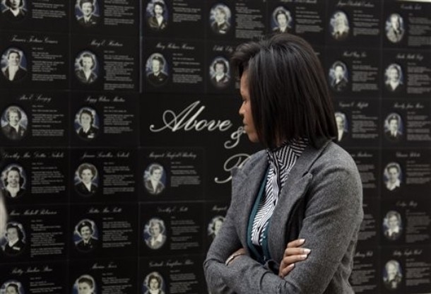 First Lady Michelle Obama looks at a display during a tour of Arlington National Cemetery's Women in Military Service for America Memorial Center in Arlington, Va., Tuesday, March 3, 2009. (AP Photo/Alex Brandon)