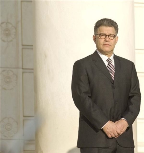 Minnesota Democratic Senate candidate Al Franken watches a changing of the guard ceremony at the Tomb of the Unknowns, Wednesday, March 25, 2009,  at Arlington National Cemetery in Arlington, Va. (AP Photo/Kevin Wolf)