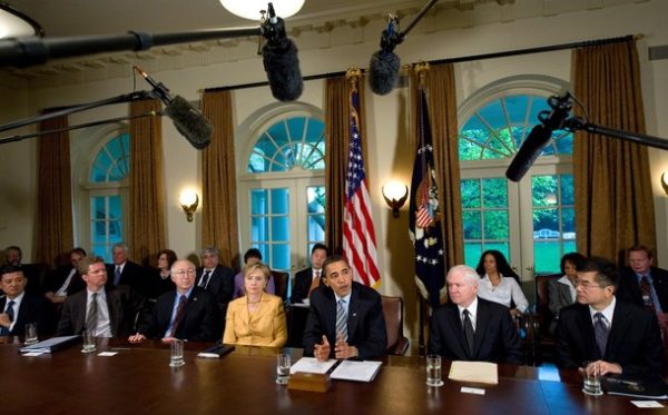 US President Barack Obama sits alongside Secretary of State Hillary Clinton and Secretary of Defense Robert Gates during his first cabinet meeting in the Cabinet Room of the White House in Washington on April 20, 2009. AFP PHOTO/Saul Loeb (Photo credit should read SAUL LOEB/AFP/Getty Images)