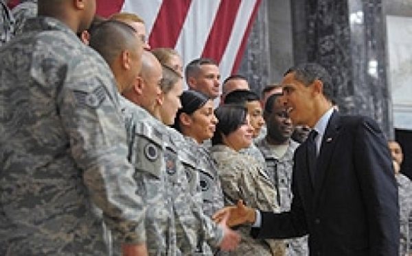 US President Barack Obama greets troops during a visit on April 7, 2009, to Camp Victory in Baghdad, Iraq.US President Barack Obama said on a surprise visit to Iraq on Tuesday that the next 18 months could be "critical" and told the war-torn country that it would soon have to look after itself. Obama, who has called for an end to US combat operations in Iraq by August next year, flew in to Baghdad aboard Air Force One on his first trip since taking office three months ago