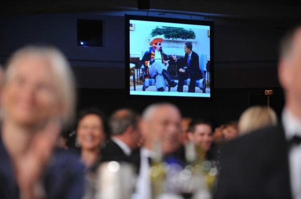 An image of US President Barack Obama in the Oval Office with a pirate is seen on a large screen while Obama tells a joke during the White House Correspondents��� Association annual dinner on May 9, 2009 at the Washington Hilton hotel in Washington.          AFP PHOTO/Mandel NGAN (Photo credit should read MANDEL NGAN/AFP/Getty Images)