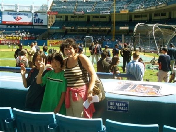 This undated handout photo provided by the White House shows Sonia Sotomayor with her nephews Conner and Corey Sotomayor at Yankee Stadium in New York. Earlier this week, President Barack Obama nominated Sotomayor to the Supreme Court to replace the retiring Justice David Souter. (AP Photo/White House)