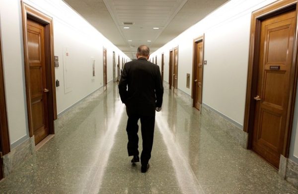 WASHINGTON - APRIL 30:  Sen. Arlen Specter (D-PA) walks down a hall in the Dirksen Senate Office Building after leaving attending a Senate Appropriations Committee hearing on Capitol Hill April 30, 2009 in Washington, DC. The committee was hearing testimony from Secretary of State Hillary Clinton and Secretary of Defense Robert Gates on proposed 2009 war supplemental appropriations.  (Photo by Mark Wilson/Getty Images)
