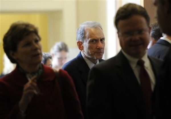 Republican-turned-Democrat Sen. Arlen Specter, D-Pa., center, emerges from a Democratic policy luncheon on Capitol Hill in Washington, Tuesday, May 5, 2009. At left is Sen. Jeanne Shaheen, D-N.H., and Sen. Jim Webb, D-Va., is at right. (AP Photo/Susan Walsh)