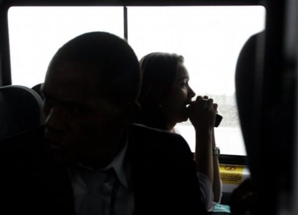 A woman, looking for information on the Airfrance flight 447 that was reported missing on its way between Rio de Janeiro and Paris, reacts while being taken to a private room at Tom Jobim airport in Rio de Janeiro, Monday, June 01, 2009. The jet carrying 228 people lost contact with air traffic controllers over the Atlantic Ocean, officials said Monday. Brazil began a search mission off its northeastern coast. (AP Photo/ Ricardo Moraes)