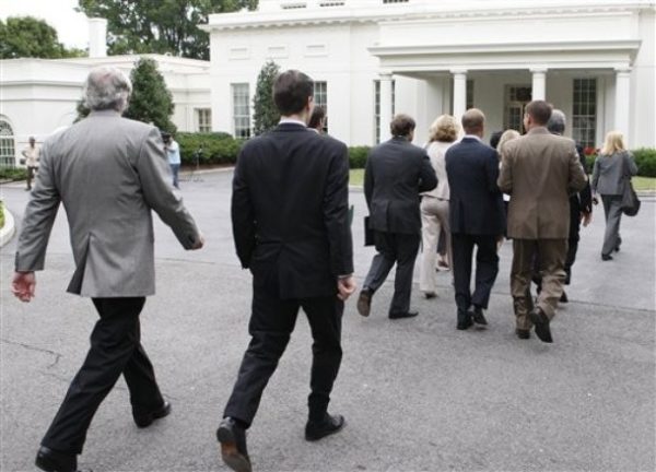 Members of Congress walk to the West Wing of the White House in Washington, Friday, July 17, 2009, to meet with White House Chief of Staff Rahm Emanuel on the health care reform. (AP Photo/Ron Edmonds)