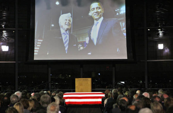 An image of Sen. Ted Kennedy and President Barack Obama, part of a film produced by Ken Burns, is projected over the coffin of Sen. Edward Kennedy during a Celebration of Life Memorial Service at the John F. Kennedy Presidential Library, Friday, Aug. 28, 2009 in Boston. (AP Photo/Charles Dharapak)