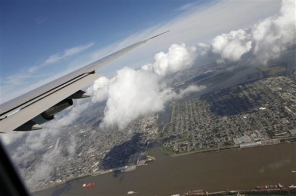the Lower 9th Ward, seen, bottom right beneath the wing, the Industrial Canal, and the Mississippi River, bottom of photo, are seen from Air Force One as President Barack Obama arrives in New Orleans, La., Thursday, Oct. 15, 2009. (AP Photo/Gerald Herbert)