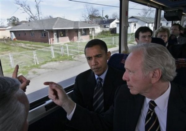 ** FILE ** In this Monday, Jan. 29, 2007 picture, Sen. Barack Obama D-Ill., left, and Sen. Joe Lieberman ID-Conn. take a bus tour through the Lower 9th Ward after a Senate Homeland Security Committee on Katrina and Rita recovery in New Orleans. Lieberman has changed his tune on Obama. After campaigning for Republican John McCain in 2008 and attacking Obama as naive, Lieberman now in 2009 showers praise on the popular new Democratic president. (AP Photo/Alex Brandon)
