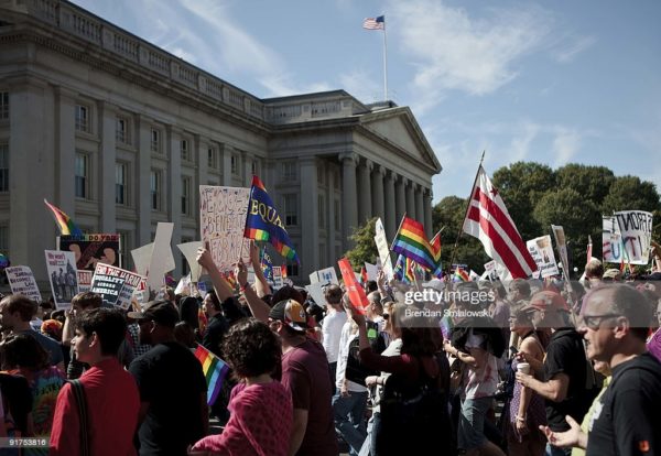 WASHINGTON - OCTOBER 11:  Activists march during a protest October 11, 2009 in Washington, DC.  Activists gathered in DC to push President Barack Obama's administration and the U.S. Congress to live up to promises to the lesbian, gay, bisexual and transgender community to advance civil rights.  (Photo by Brendan Smialowski/Getty Images)