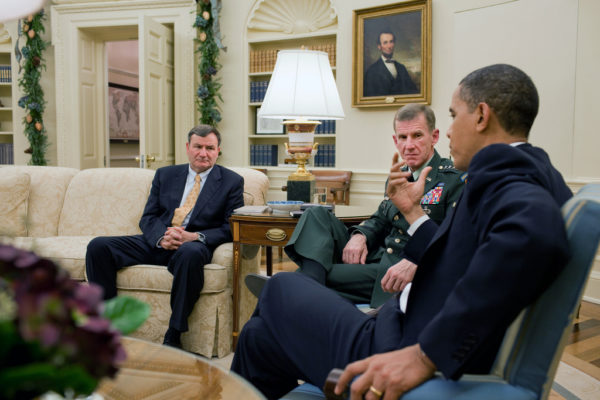 President Barack Obama meets with United States Ambassador to Afghanistan Karl Eikenberry, left, and General Stanley McChrystal, Commander, International Security Assistance Force, in the Oval Office, Dec. 7, 2009. (Official White House Photo by Pete Souza)This official White House photograph is being made available only for publication by news organizations and/or for personal use printing by the subject(s) of the photograph. The photograph may not be manipulated in any way and may not be used in commercial or political materials, advertisements, emails, products, promotions that in any way suggests approval or endorsement of the President, the First Family, or the White House.