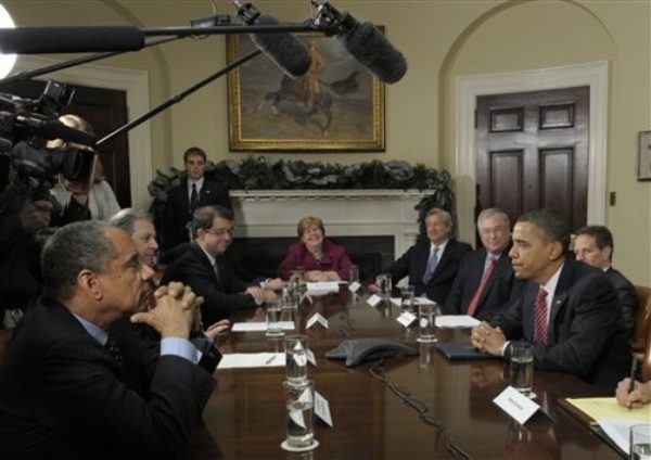 President Barack Obama meets with members of the financial industry in the Roosevelt Room of the White House in Washington, Tuesday, Dec.  15, 2009, to discuss the economic recovery. Clockwise, from left are, American Express Chief Executive Officer Ken Chenault; Wells Fargo President and Chief Executive Officer John Stumpf; Bank of New York Mellon Chairman and Chief Executive Officer Bob Kelly; Council of Economic Advisers Chair Christina Romer; JPMorgan Chase Chairman and Chief Executive Officer Jamie Dimon; PNC Chairman and Chief Executive Officer Jim Rohr; Treasury Secretary Timothy Geithner; and the president. (AP Photo/Susan Walsh)