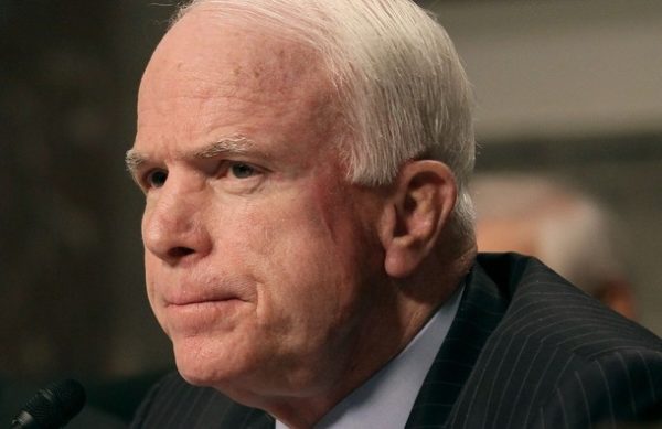 WASHINGTON - FEBRUARY 02: Sen. John McCain (R-AZ) listens to Defense Secretary Robert Gates speak during a Senate Armed Services Committee hearing on Capitol Hill on February 2, 2010 in Washington, DC. The committee is hearing testimony on the proposed Department of Defense budget request for fiscal year 2011, and reviewing the "Don't Ask, Don't Tell" policy. (Photo by Mark Wilson/Getty Images)