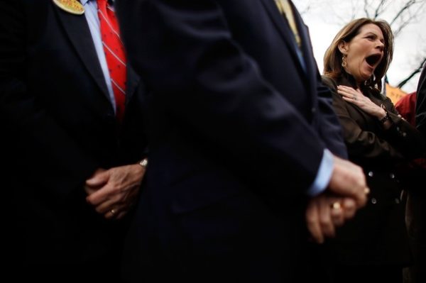 WASHINGTON - MARCH 16: Rep. Michele Bachmann (R-MN) yawns during a "CODE RED" rally in opposition to the health care reform bill on Capitol Hill March 16, 2010 in Washington, DC. Sponsored by The American Grass Roots Coalition and the Tea Party Express, the rally focused attention and opposition to the congressional Democrats' efforts to push through a final vote on health care reform by the end of the week. (Photo by Chip Somodevilla/Getty Images)