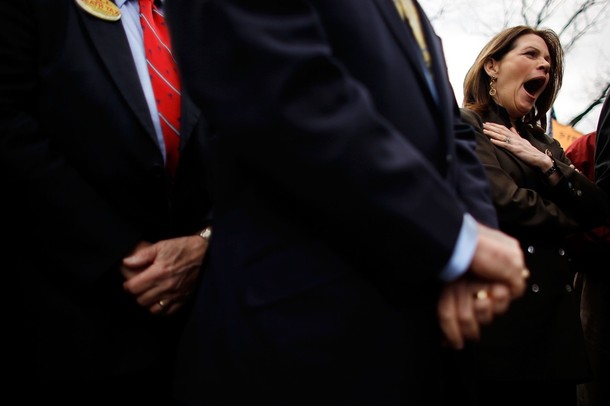 WASHINGTON - MARCH 16:  Rep. Michele Bachmann (R-MN) yawns during a "CODE RED" rally in opposition to the health care reform bill on Capitol Hill  March 16, 2010 in Washington, DC. Sponsored by The American Grass Roots Coalition and the Tea Party Express, the rally focused attention and opposition to the congressional Democrats' efforts to push through a final vote on health care reform by the end of the week.  (Photo by Chip Somodevilla/Getty Images)