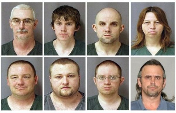 This combo of eight photos provided by the U.S. Marshals Service on Monday March 29, 2010 shows from top left, David Brian Stone Sr., 44, of Clayton, Mich,; David Brian Stone Jr. of Adrian, Mich,; Jacob Ward, 33, of Huron, Ohio; Tina Mae Stone and bottom row from left, Michael David Meeks, 40, of Manchester, Mich,; Kristopher T. Sickles, 27, of Sandusky, Ohio; Joshua John Clough, 28, of Blissfield, Mich.; and Thomas William Piatek, 46, of Whiting, Ind.,. Nine suspects tied to Hutaree, a Christian militia that was preparing for the Antichrist were charged with conspiring to kill police officers, then kill scores more by attacking a funeral using homemade bombs, federal prosecutors said Monday. Federal authorities say Stone's other son, Joshua Matthew Stone is a fugitive. Piatek, 46, of Whiting, Ind., was arrested Sunday in Illinois after an FBI raid Saturday in Hammond, Ind. In court Monday, he initially said he was the person named in the federal indictment, but when read the allegations, he said "I'm not that guy." U.S. District Judge Paul Cherry ordered Piatek to return Wednesday for an identity and bond hearing. (AP Photo/U.S. Marshall)