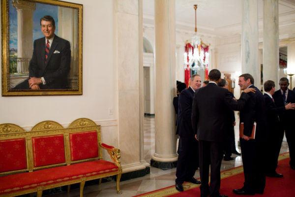 President Barack Obama talks with Michael G. Morris, right, of American Electric Power Company, and David Cote, of Honeywell International Inc., in the Cross Hall of the White House, before a dinner with CEOs, Feb. 24, 2010. (Official White House Photo by Pete Souza) This official White House photograph is being made available only for publication by news organizations and/or for personal use printing by the subject(s) of the photograph. The photograph may not be manipulated in any way and may not be used in commercial or political materials, advertisements, emails, products, promotions that in any way suggests approval or endorsement of the President, the First Family, or the White House.